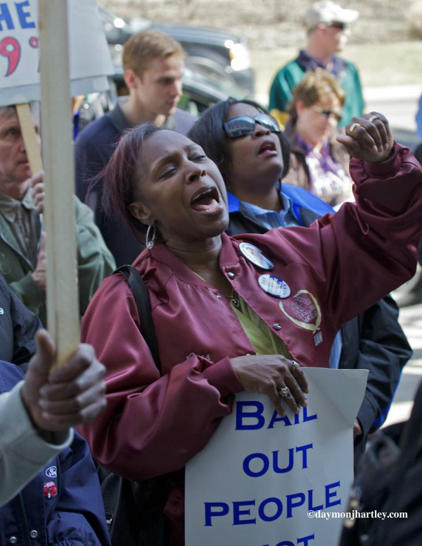 Cassandra Ford, UAW Local 22 Retiree Chapter Financial Secretary demonstrating against foreclosures in Detroit. PHOTO/DAYMONJHARTLEY.COM