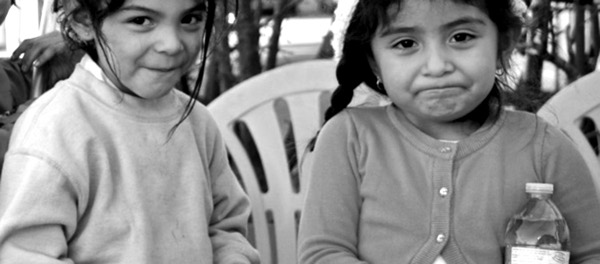 These children live in Palo Alto, CA, part of Silicon Valley, which is home to high tech corporations and one-third of all venture capital investment in the country. The city is enforcing the largest mass displacement of people in their history. PHOTO/ARAM JAMES, SILICON VALLEY DEBUG