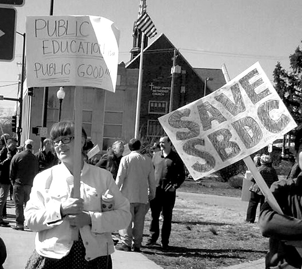 Protest over the budget cuts leading to layoffs of 55 employees at a community college in Southern Illinois. Academics are becoming disposable members of the working class. PHOTO/STEPHANIE ESTERS, THESOUTHERN.COM