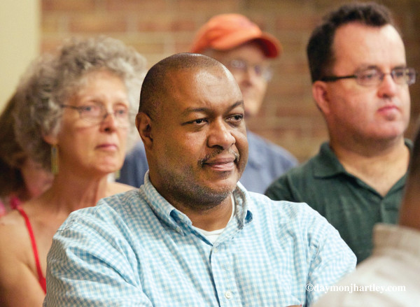 People listen to a report back from delegates to the Democratic National Convention at a Detroit Labor for Bernie gathering. PHOTO/DAYMONJHARTLEY