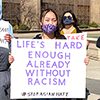 stop Asian hate demonstrator