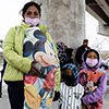 Migrant mother with her children in Tijuana