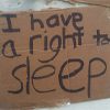 protest sign at Berkeley City Hall left by young homeless protesters