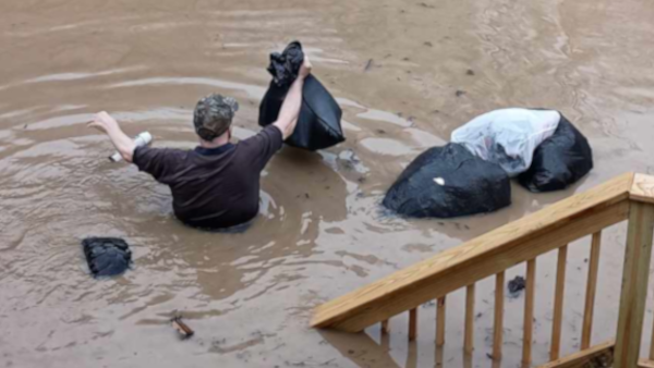 This is a picture of my dad, Jerry Maynard, who has dementia and an open diabetic foot ulcer escaping as the flood water raised. Thankfully we were able to get him to a neighbor to care for him until I could get out the next day. Photos on this page by Barbi-Ann Maynard