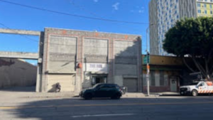 This small warehouse in Skid Row, known as “The Bin,”  is one of two facilities in LA where the City falsely claimed it stored the seized belongings of tens of thousands of unhoused people taken over the years in police driven sweeps of encampments.  In reality, the belongings were routinely destroyed and trashed, including gear like tents and blankets, personal papers and IDs, wheel chairs, bicycles, medications and other essential and valued possessions essential to survival. Photo/ Cathleen Williams