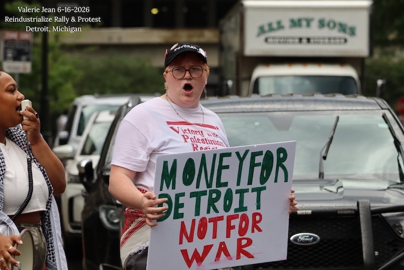 Protest at reindustrialization conference in Detroit